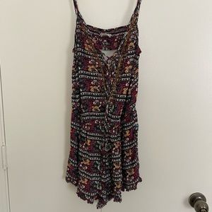 Floral ruffle open back romper